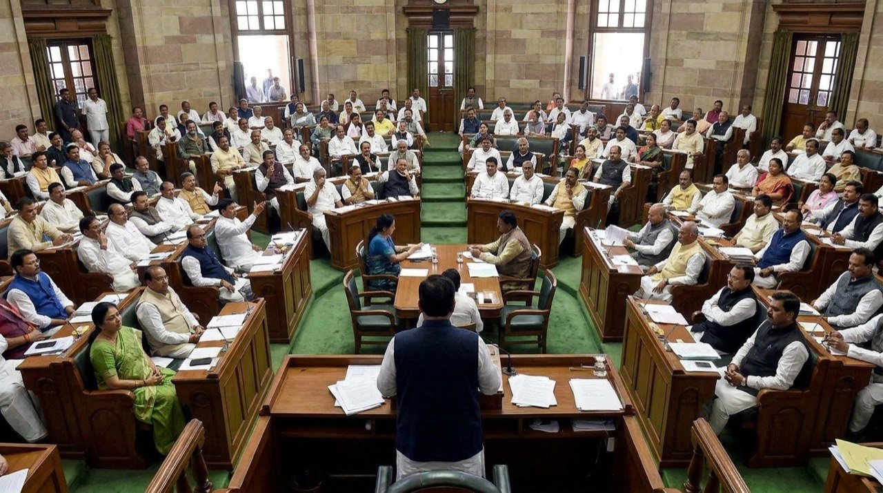 Members of Parliament seated in the Lok Sabha chamber during a debate.