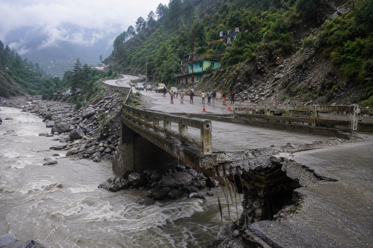 Collapsed Bailey bridge on National Highway 5 in Kinnaur with a truck in the Sutlej river below