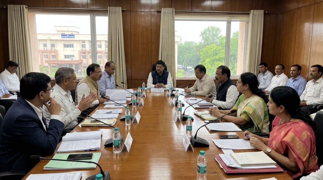 Madhya Pradesh Uniform Civil Code committee meeting in Bhopal with officials and stakeholders seated around a consultation table